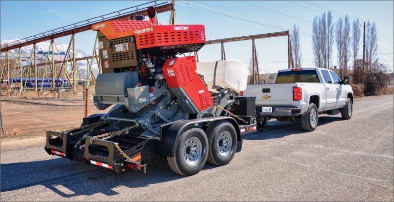 https://asphaltzipper.com/c/wp-content/uploads/2023/07/DEH_7829_AuroraHDR2019-license-plate-number-obscured-CMYK-768x395.jpg