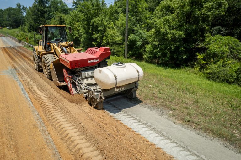 https://asphaltzipper.com/c/wp-content/uploads/2023/12/full-width-roads-dji_0075-768x512.jpeg